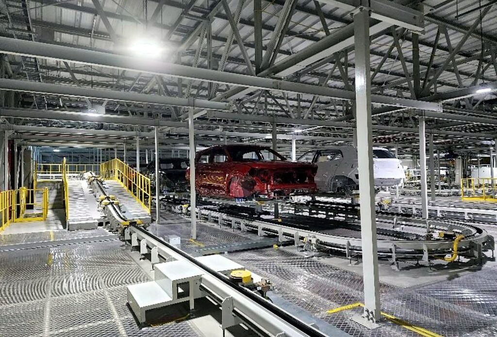 Car bodies on the paint shop conveyor line, Cikarang Deltamas