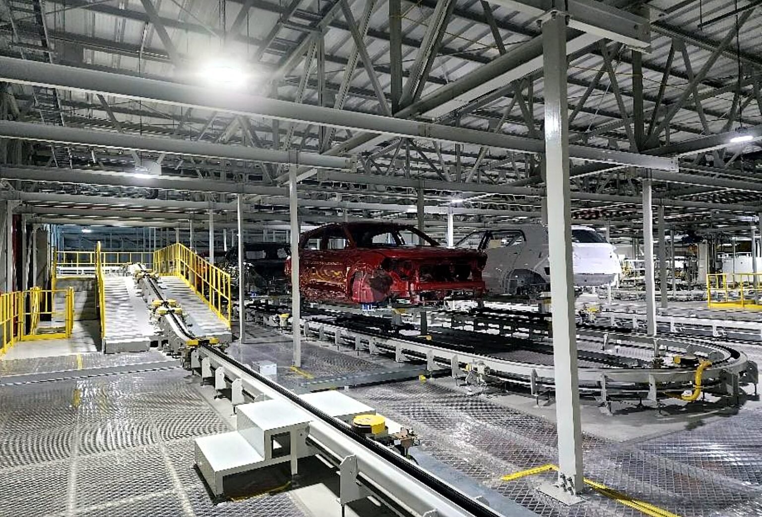 Car bodies on the paint shop conveyor line, Cikarang Deltamas