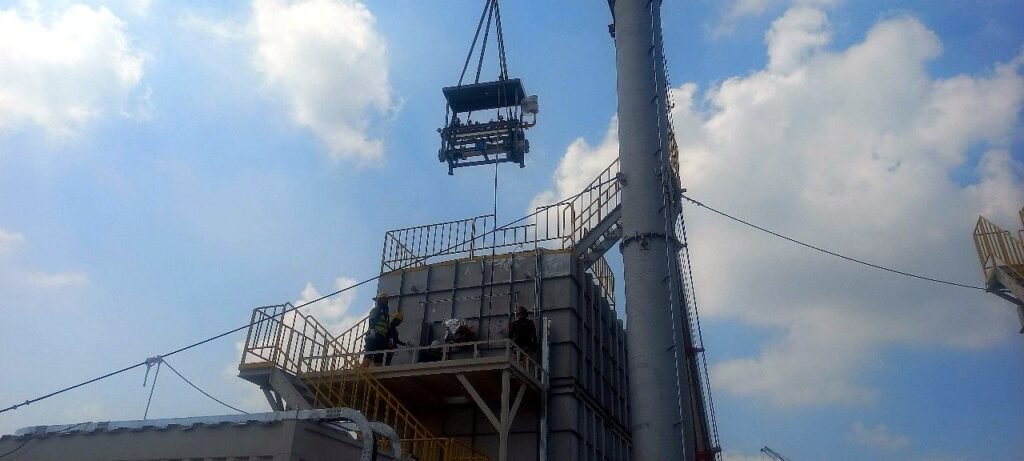 RTO module lifted onto its structure by crane, Surabaya